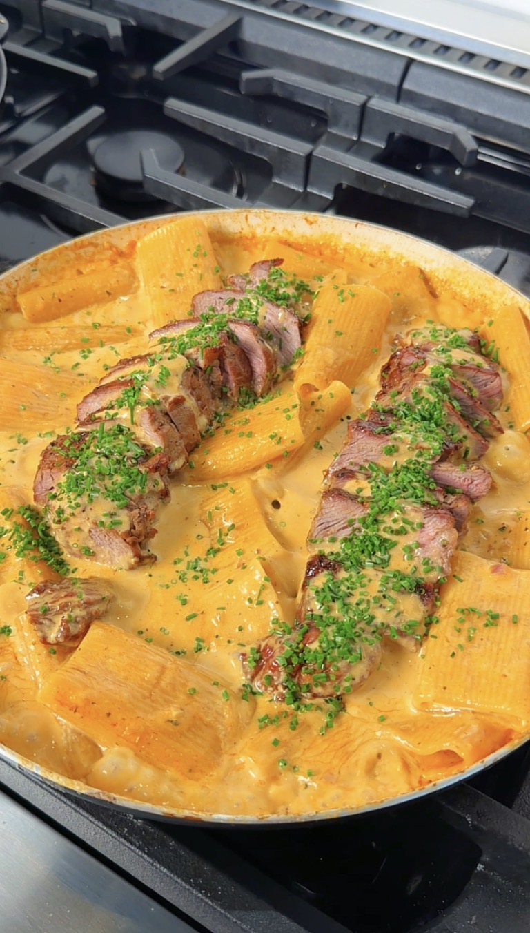creamy steak pasta in a pan